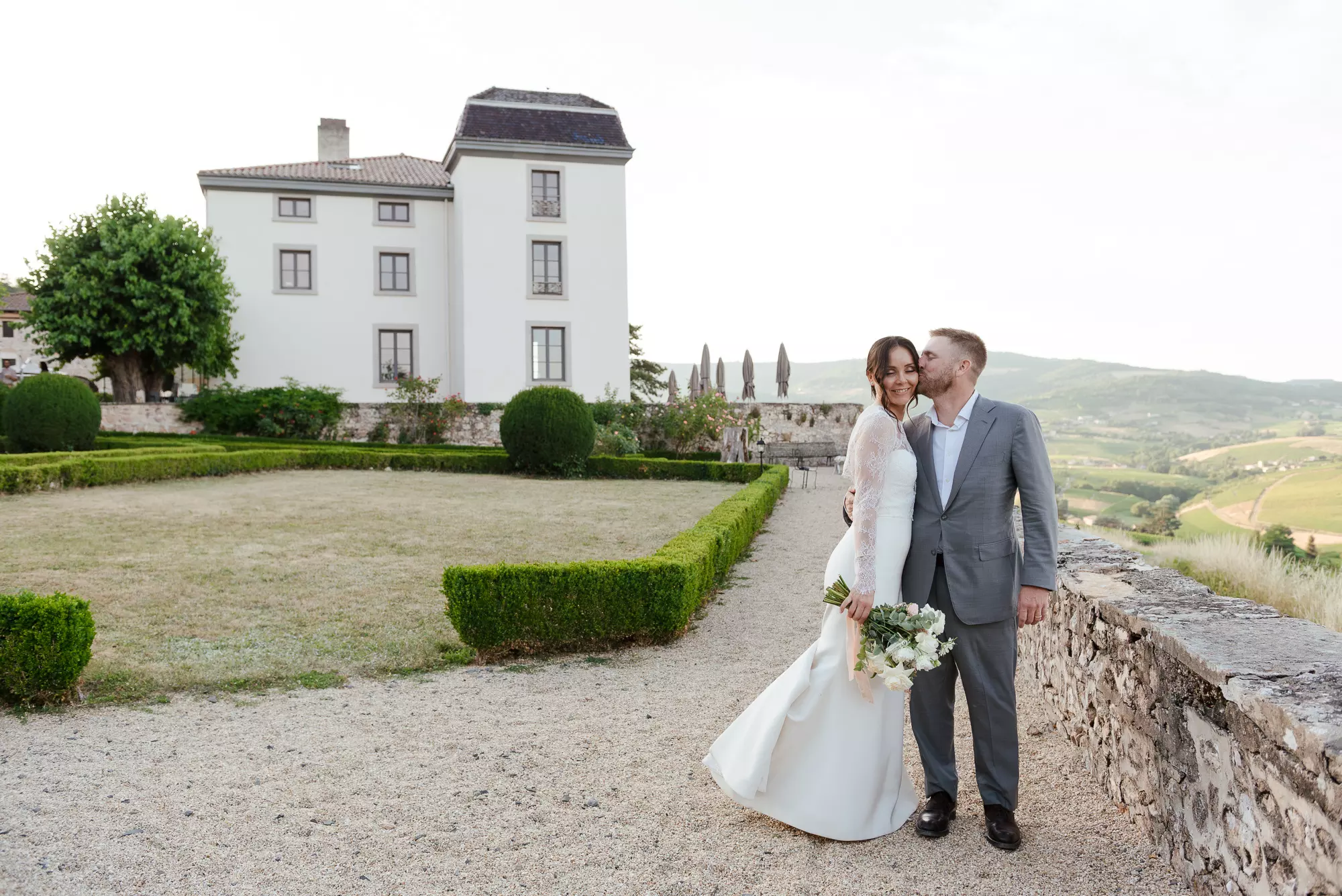 Bride and groom during their French-American wedding at Château du Souzy near Lyon