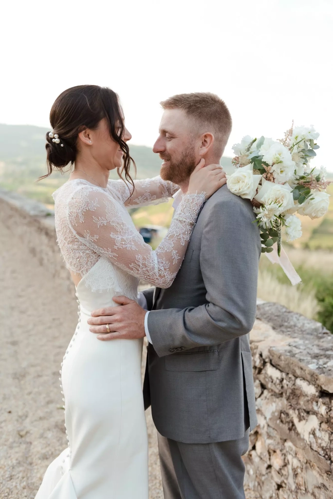 French-American newlyweds embracing among the vineyards in Beaujolais near Lyon